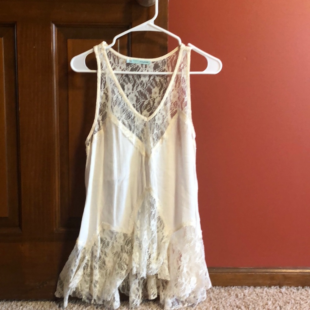 Maurice’s cream tank top with lace. Small